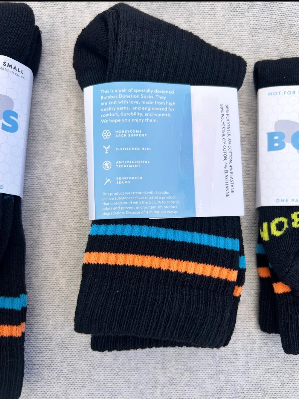 Bombas Men's Black Ankle Socks with Blue and Orange Stripes